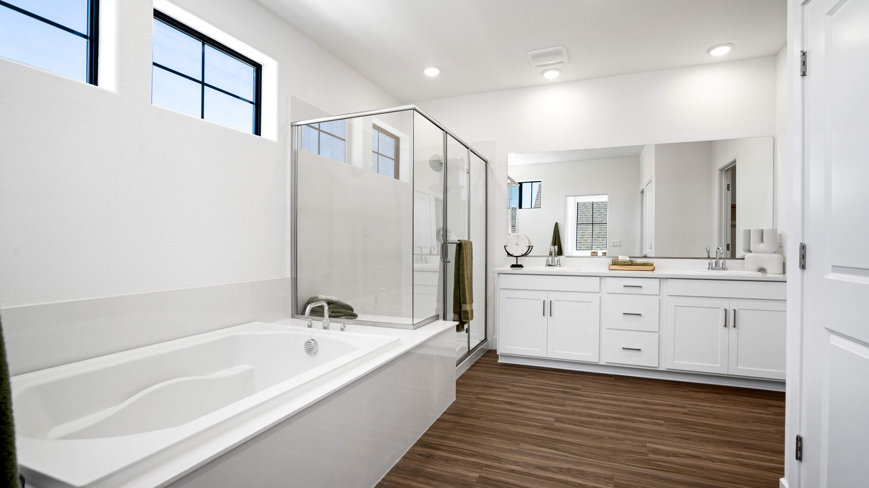 A bathroom with a tub and sink.