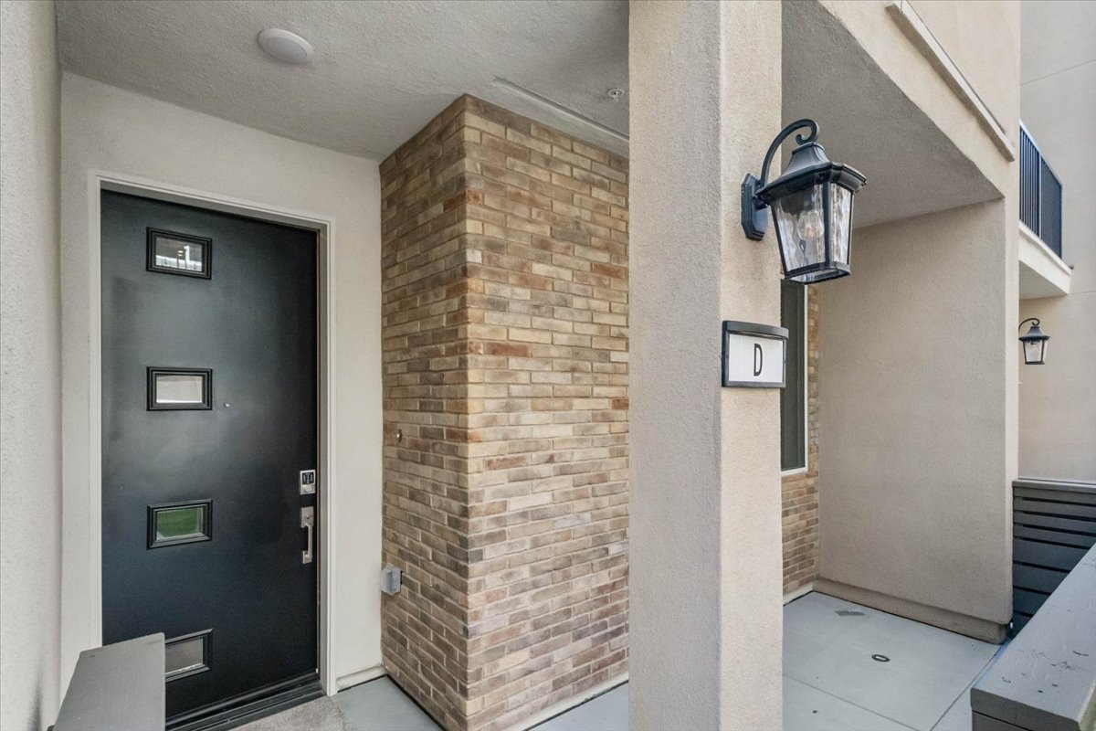 A door and a brick wall.