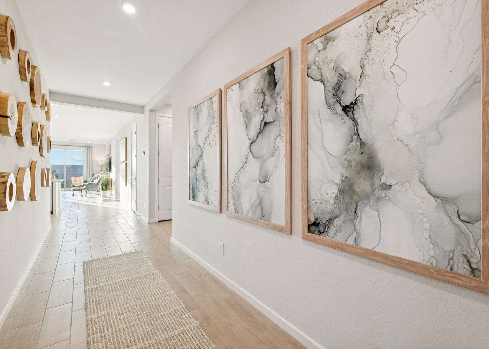 A hallway with white walls.