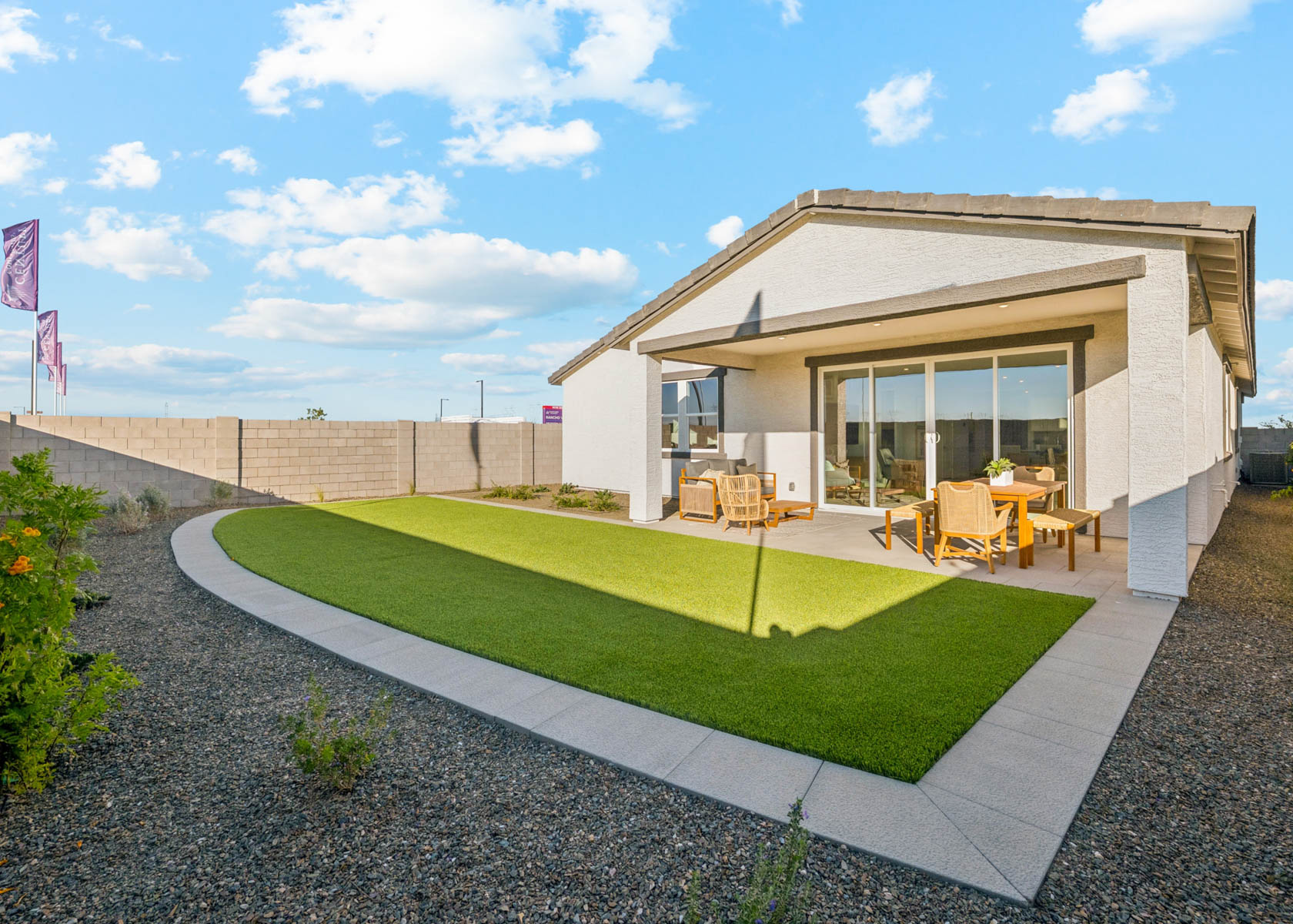 A house with a large lawn.