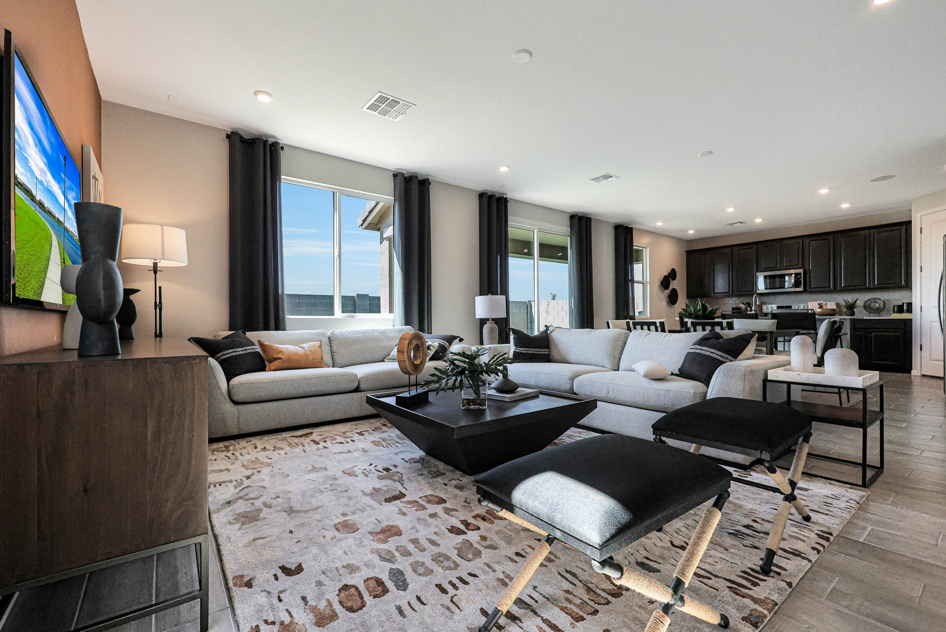 A living room with a tv and couches.