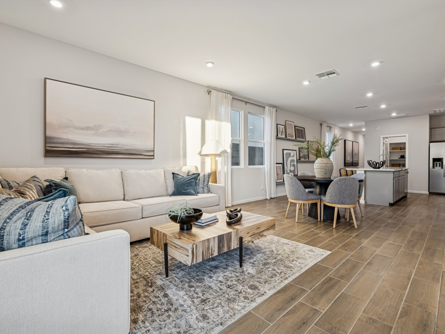 A living room with a couch and a coffee table.