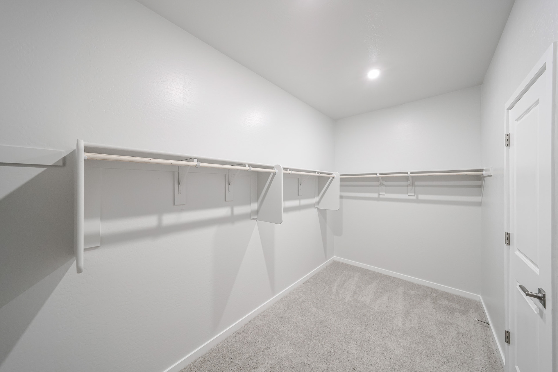 A white room with a white wall.