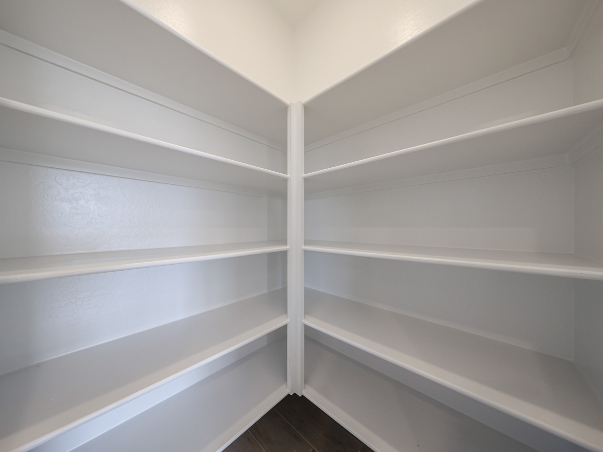 A white shelf with white shelves.