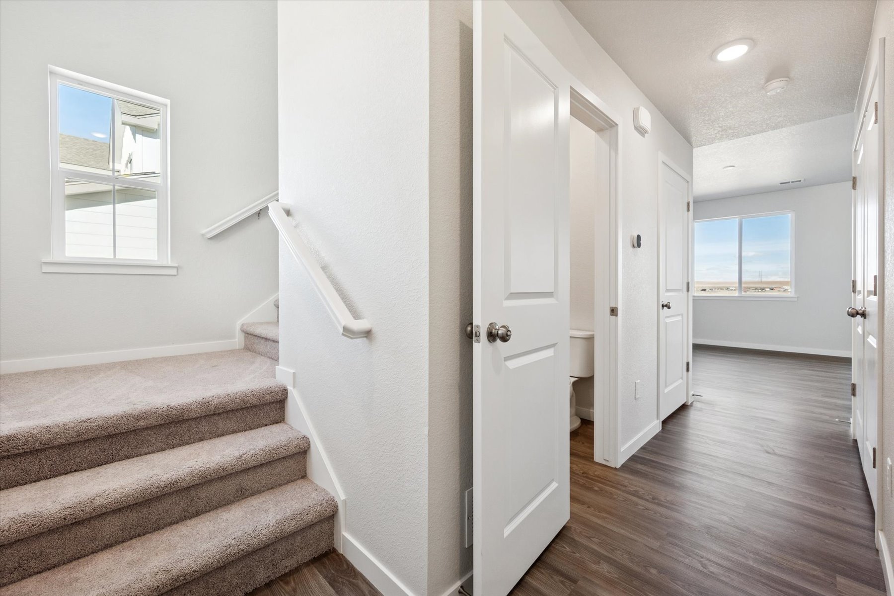 A room with white doors.