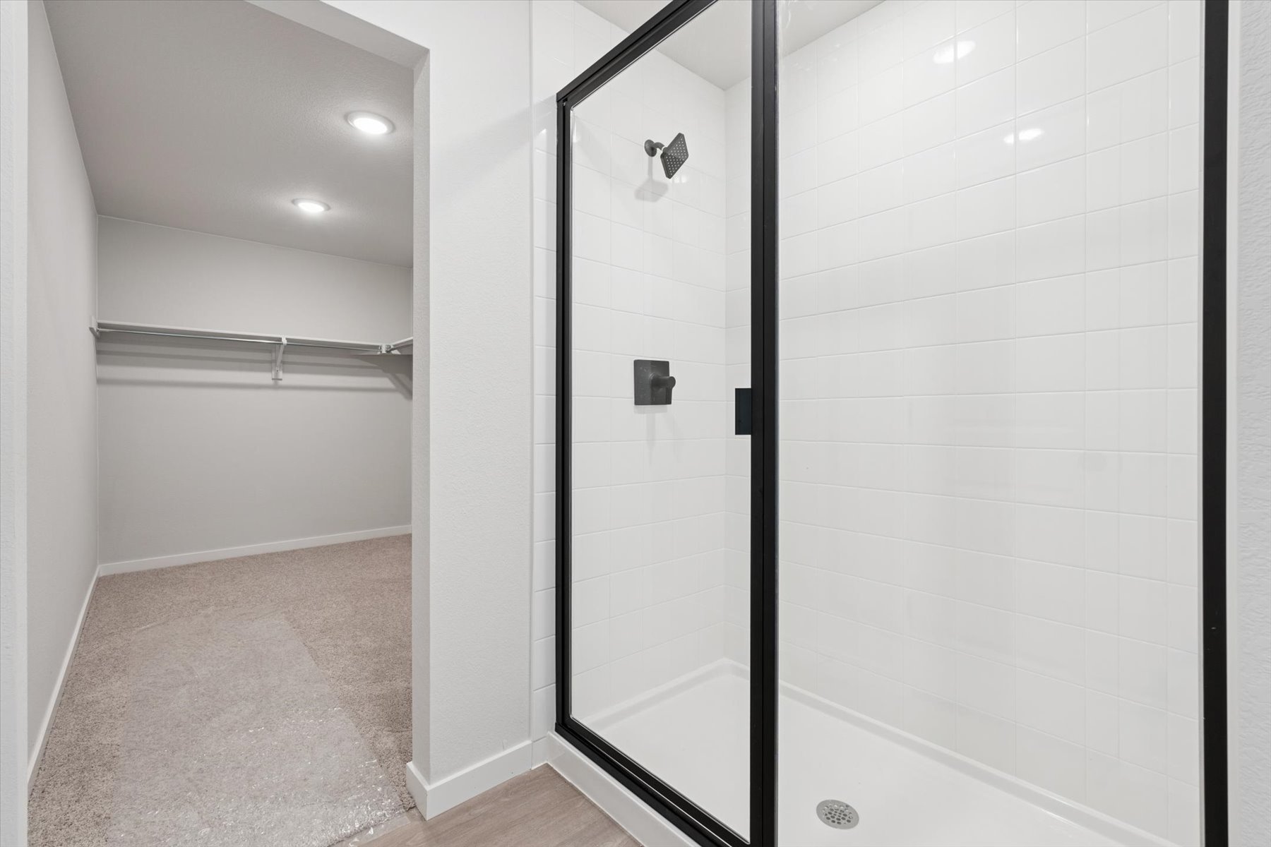 A shower unit in a bathroom.