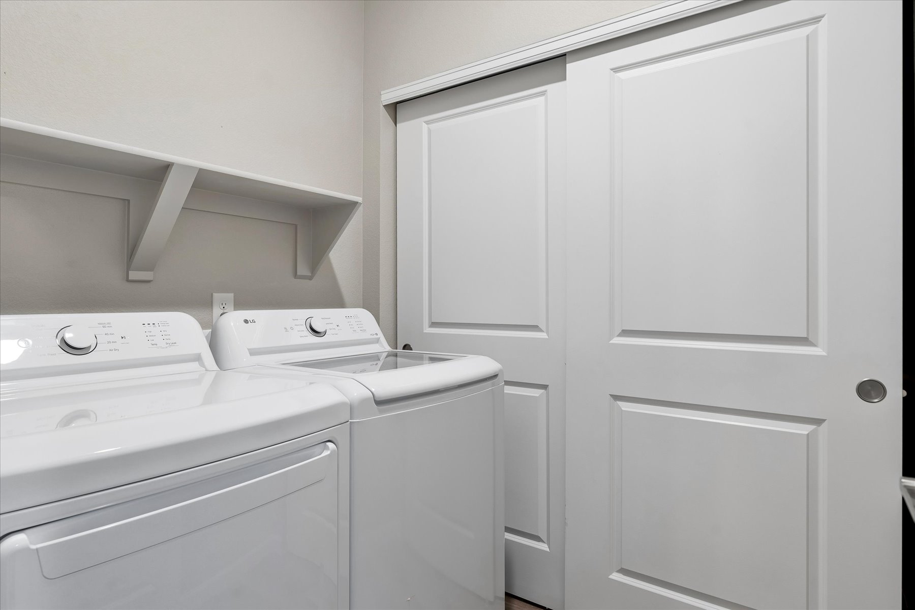 A white kitchen with white cabinets.