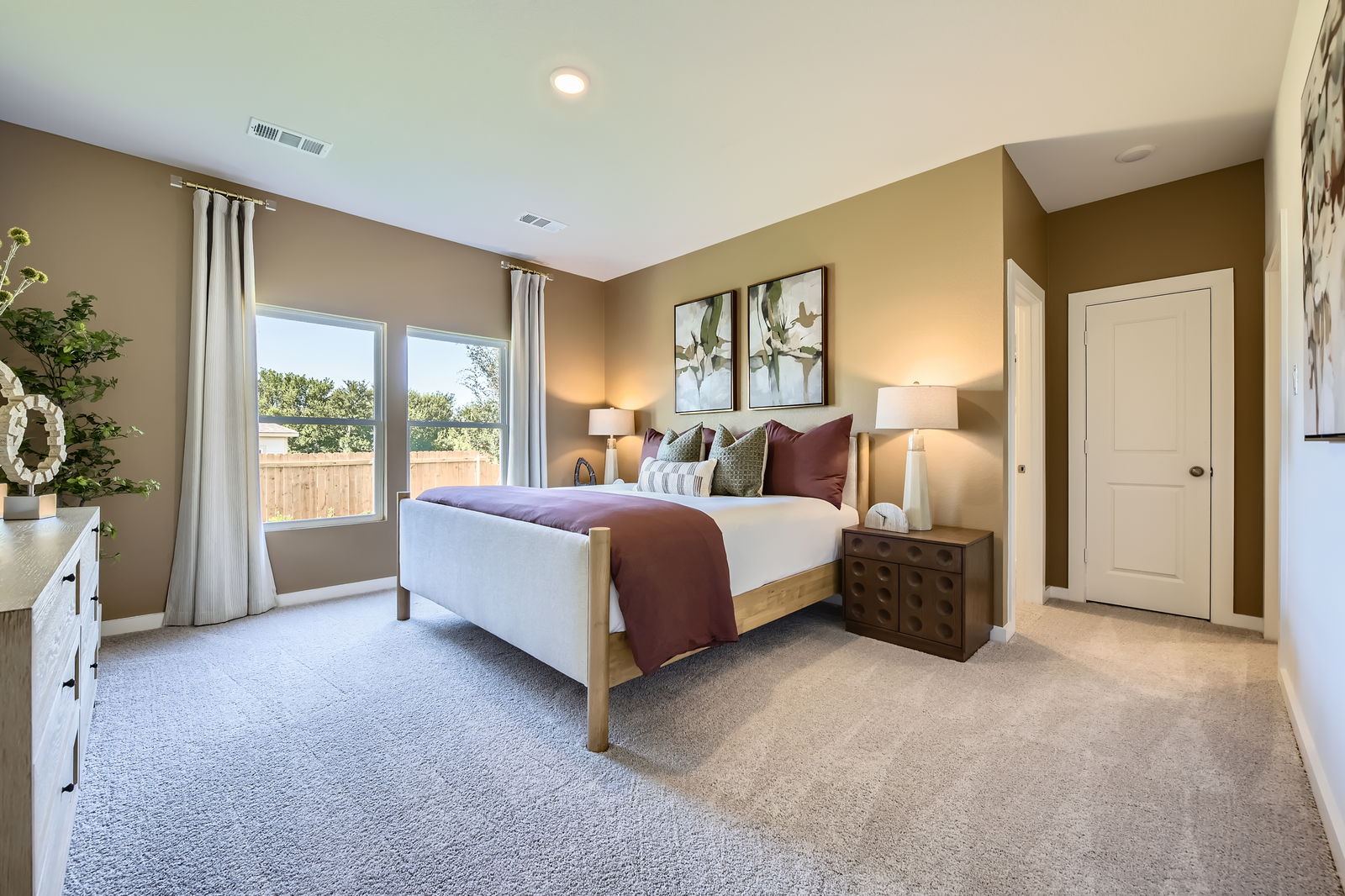 A bedroom with a large bed.