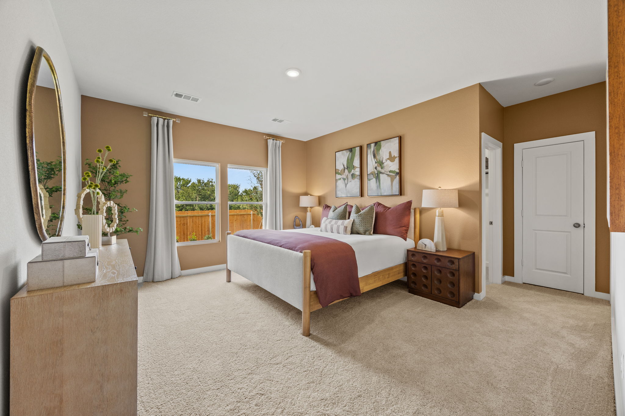 A bedroom with a large bed.