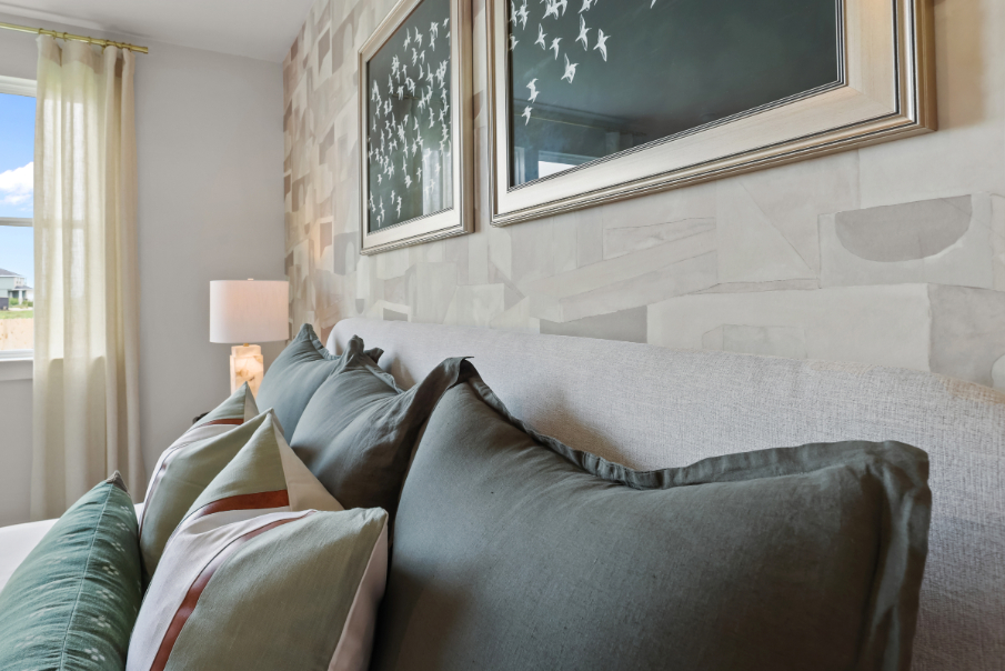 A couch with pillows.