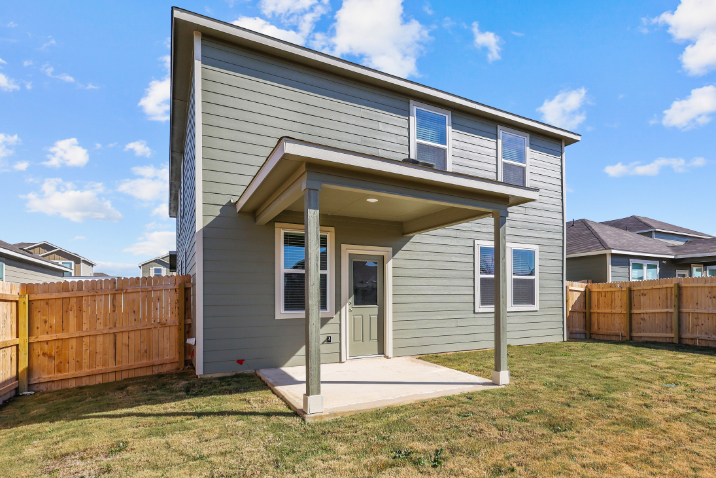 A house with a fence around it.