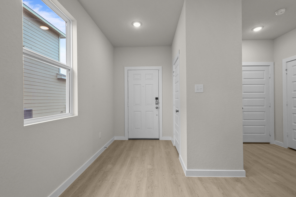 A room with white doors.