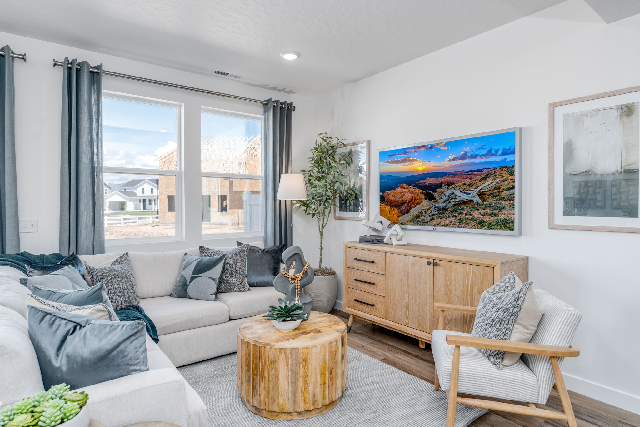 A living room with a large window.