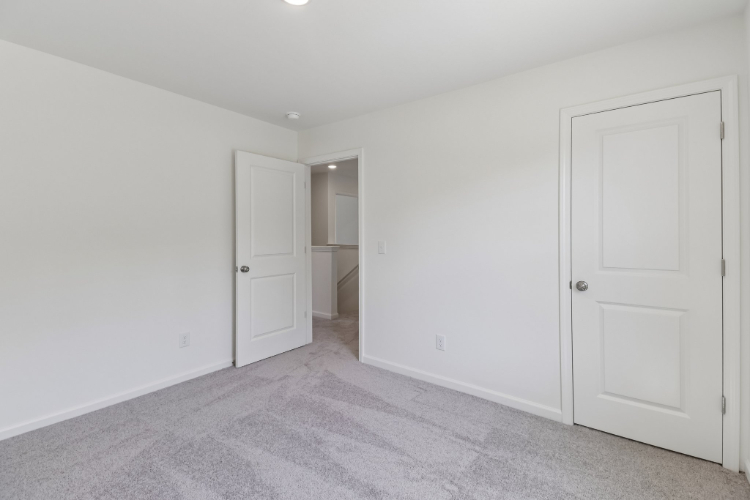 A room with white doors.